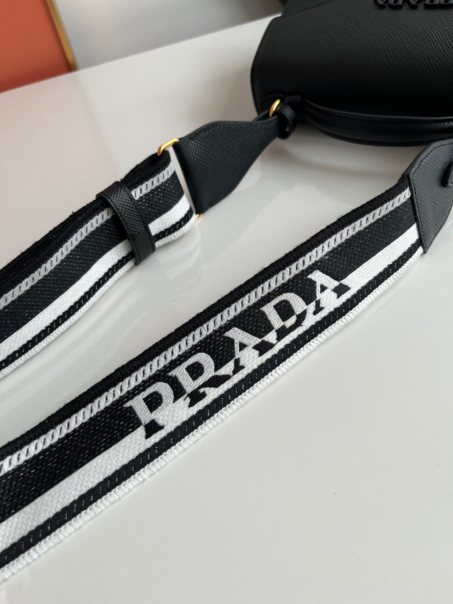 Prada Monochrome Saffiano 21 Leather Bag in Black 21x14x6.5cm